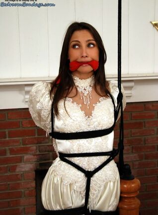 corded up and ballgagged